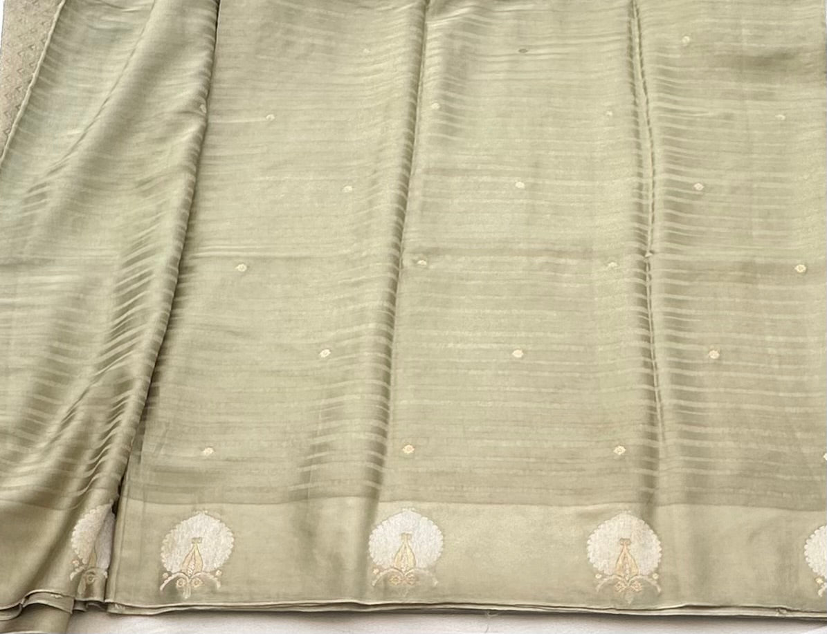 Light mehendi green  with silver nd gold motifs banaras silk
