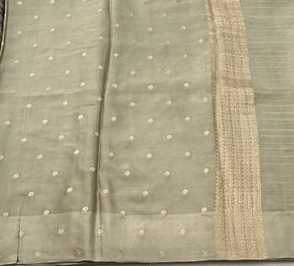 Light mehendi green  with silver nd gold motifs banaras silk